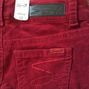 Red corduroy skinny jeans